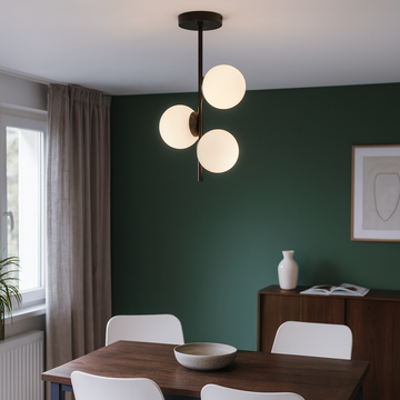 Black chandelier with white globes